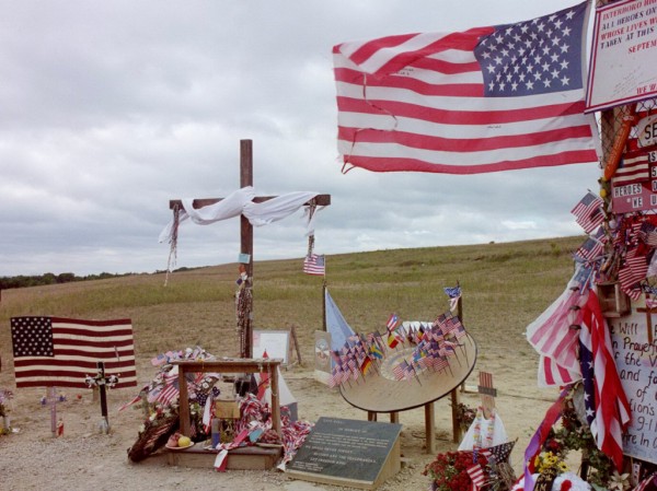 Cross and American Flag at Temporary Memorial